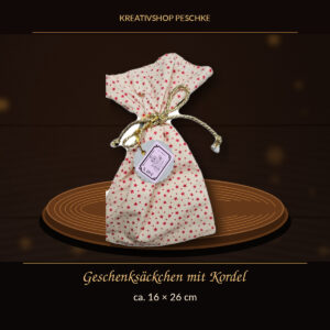 Geschenksäckchen aus Stoff – gelb mit roten Sternen